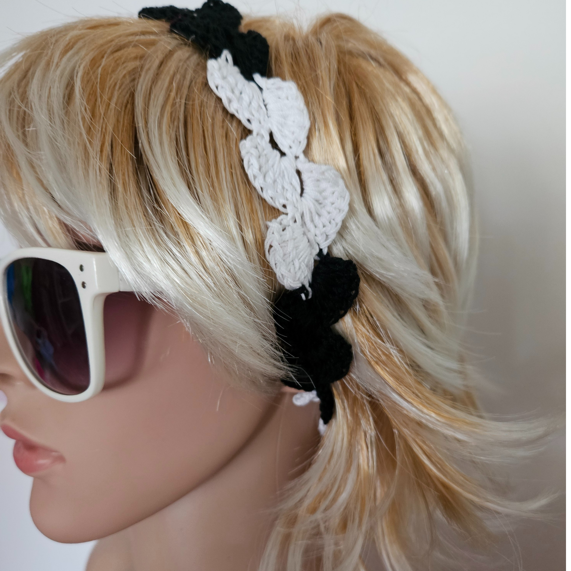Black & white petal headband model side pose