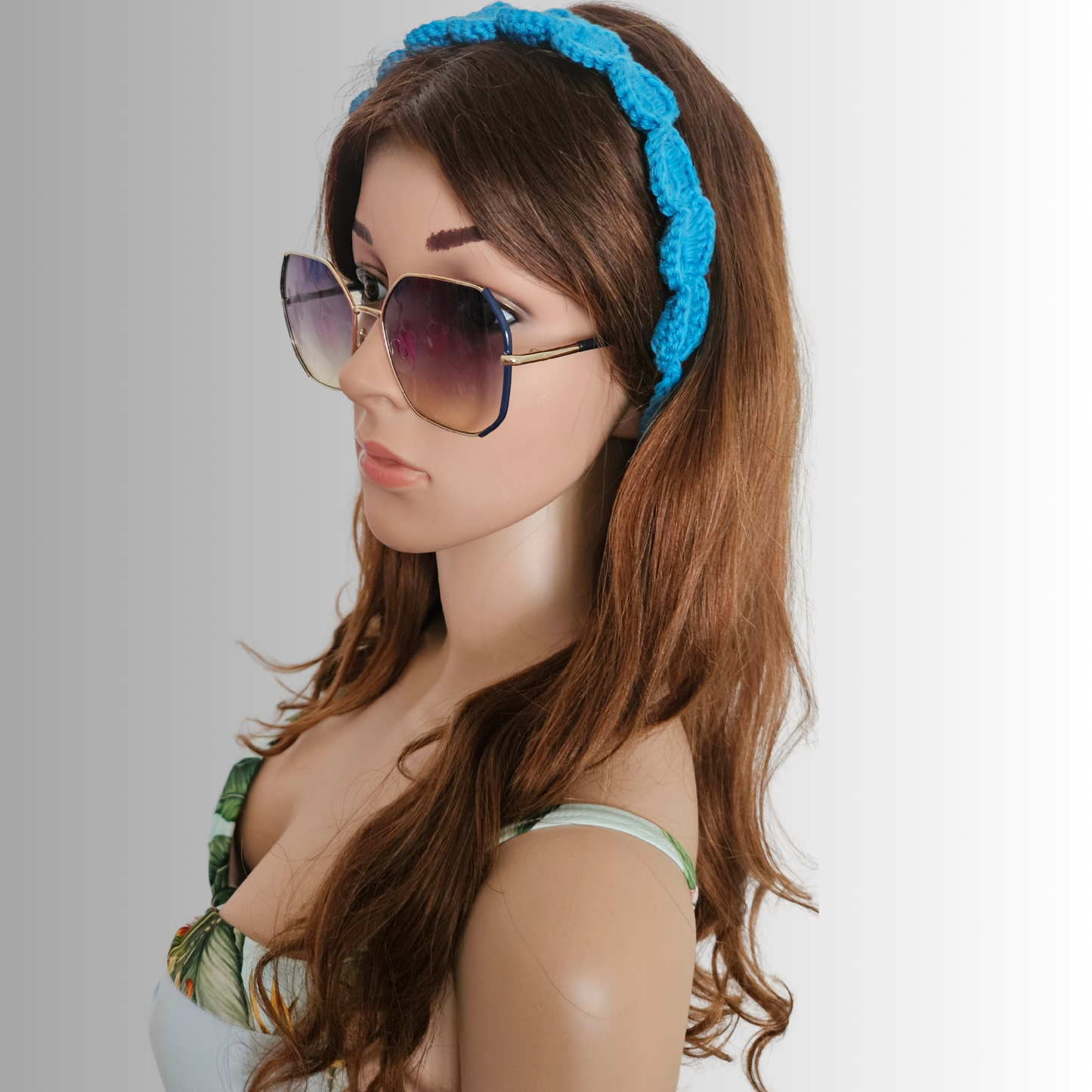 Blue_tie_back_crochet_headband_model_pose
