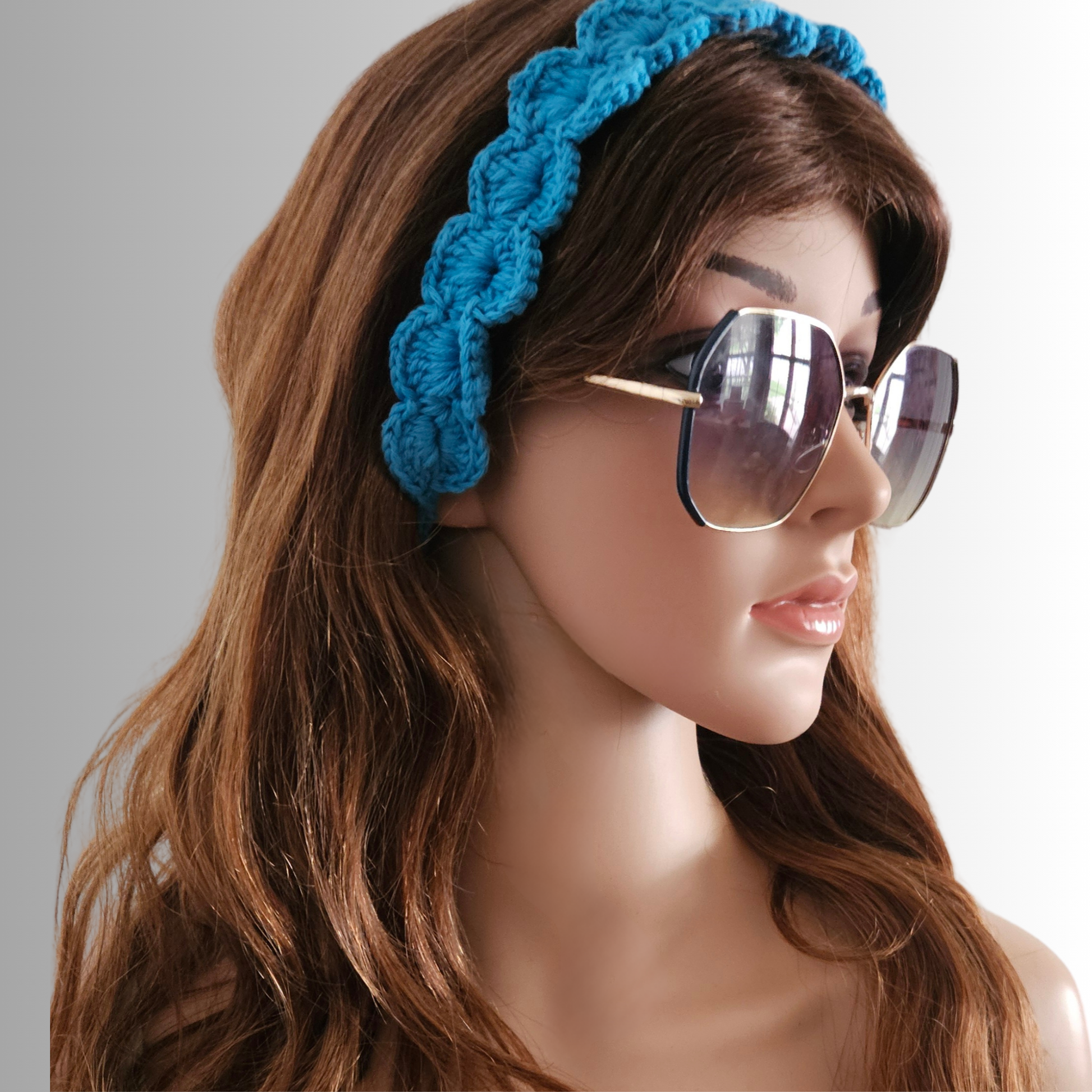 Blue_tie_back_crochet_headband_model_side_pose