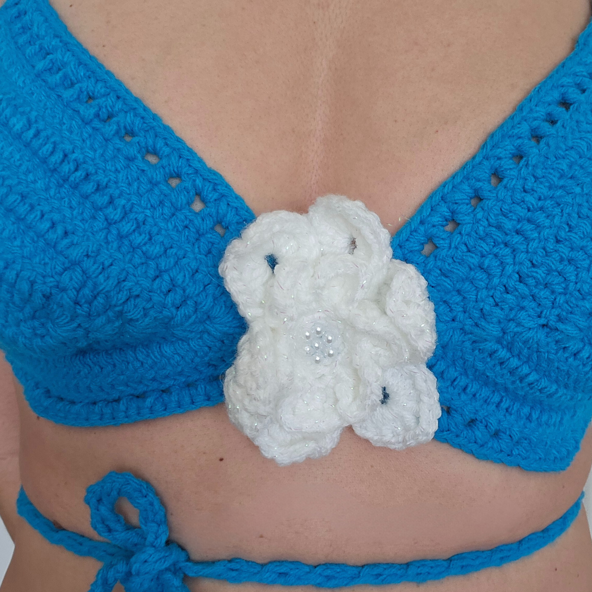Elegant Azure Crochet Bandeau Crisscross Top Model Pose flower detail