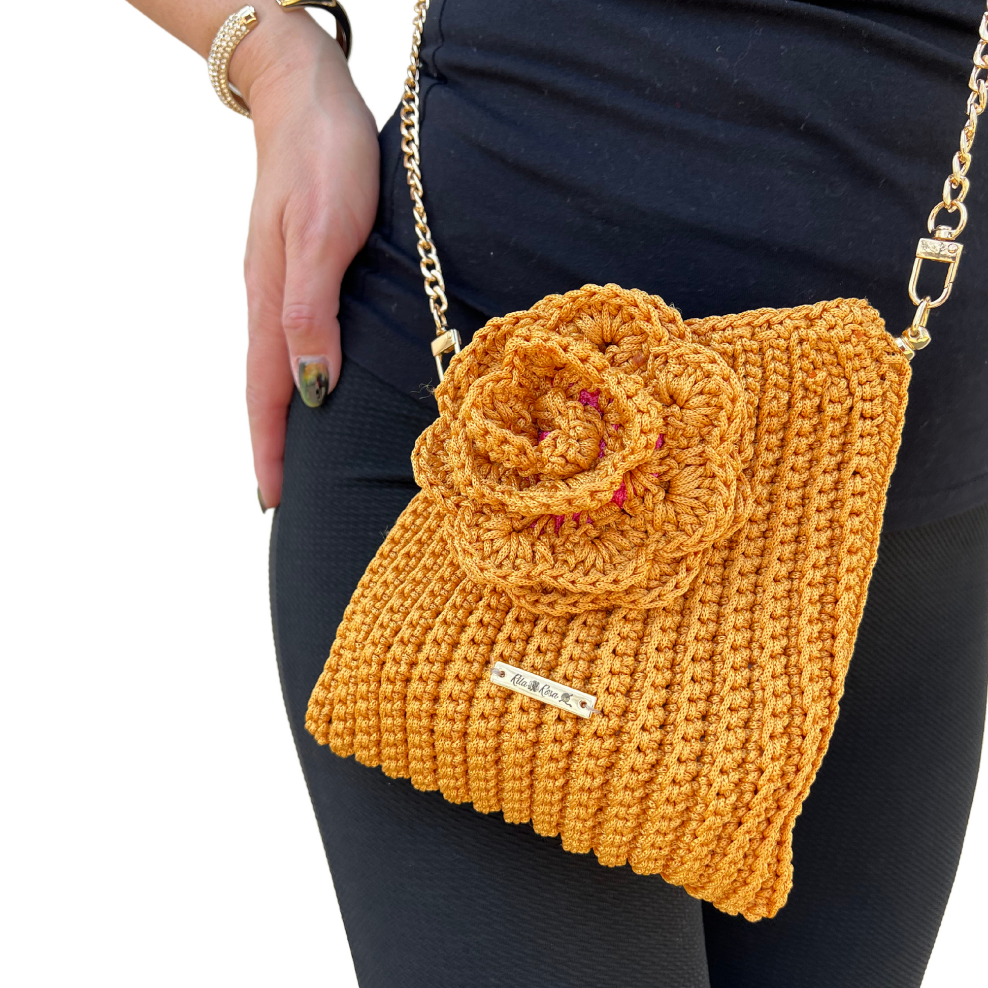 Model showcasing Gold Flora Bloom Crochet Crossbody Bag – handmade floral statement bag, lightweight macramé design, perfect for spring and summer outfits.
