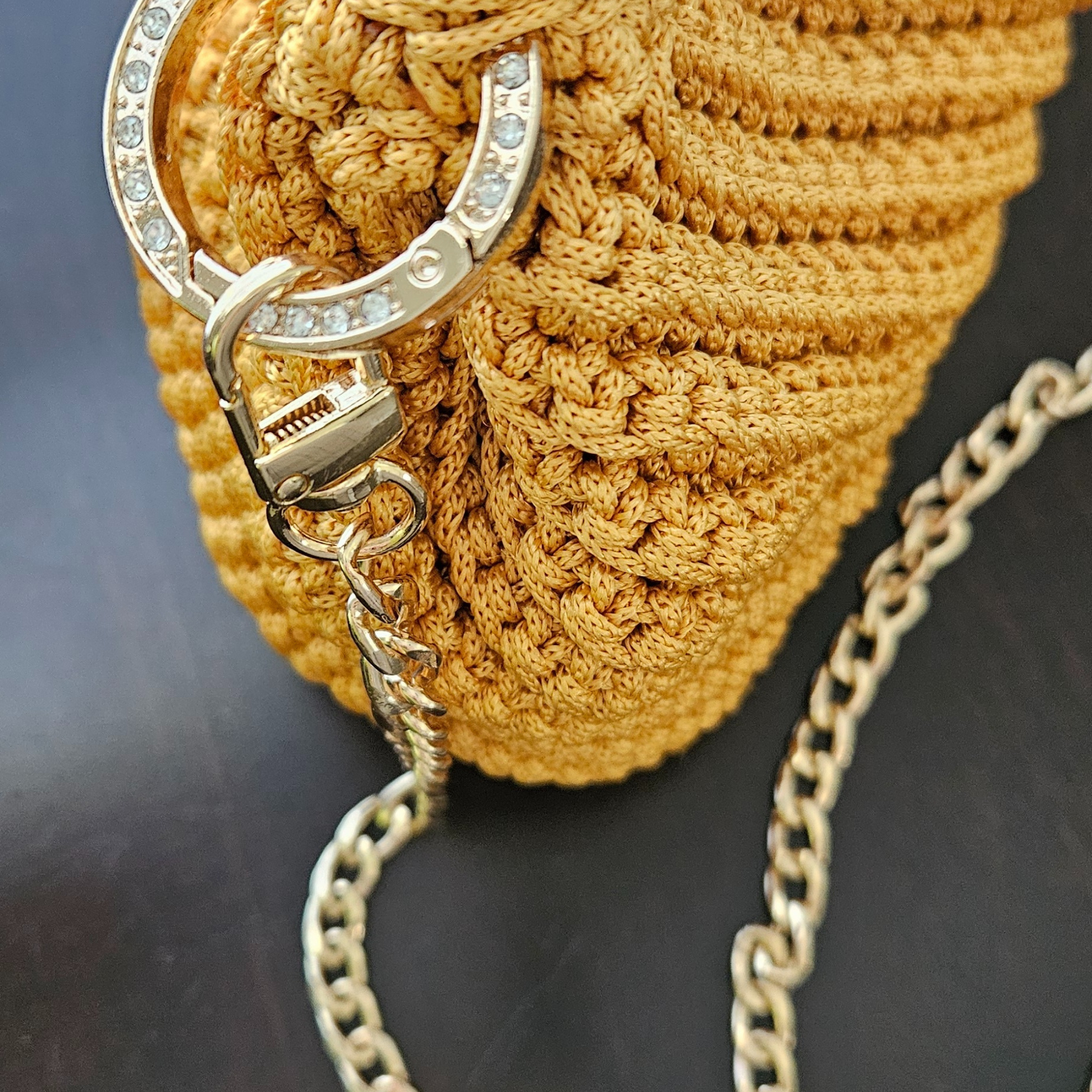Close-up of rhinestone spring carabiner clip on Modern Macrame Crossbody – sparkling detail for a touch of glamour.