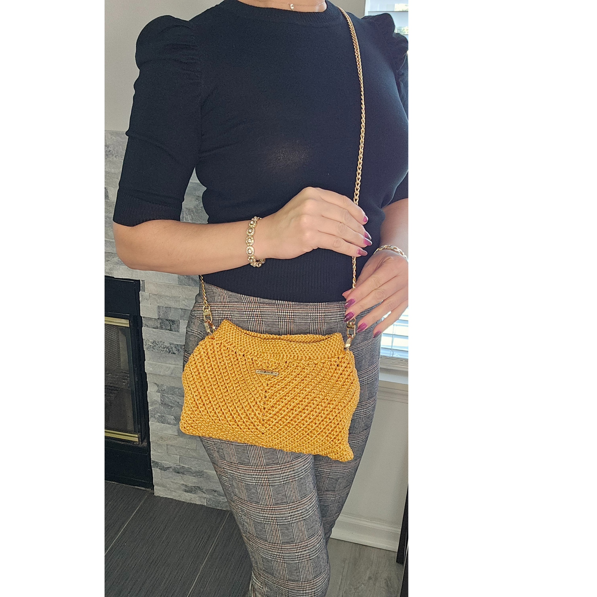 Model showcasing Gold Modern Macrame Crossbody – exclusive handcrafted bag with gold accents, lightweight macramé design, perfect for weddings, special events, and everyday luxury.