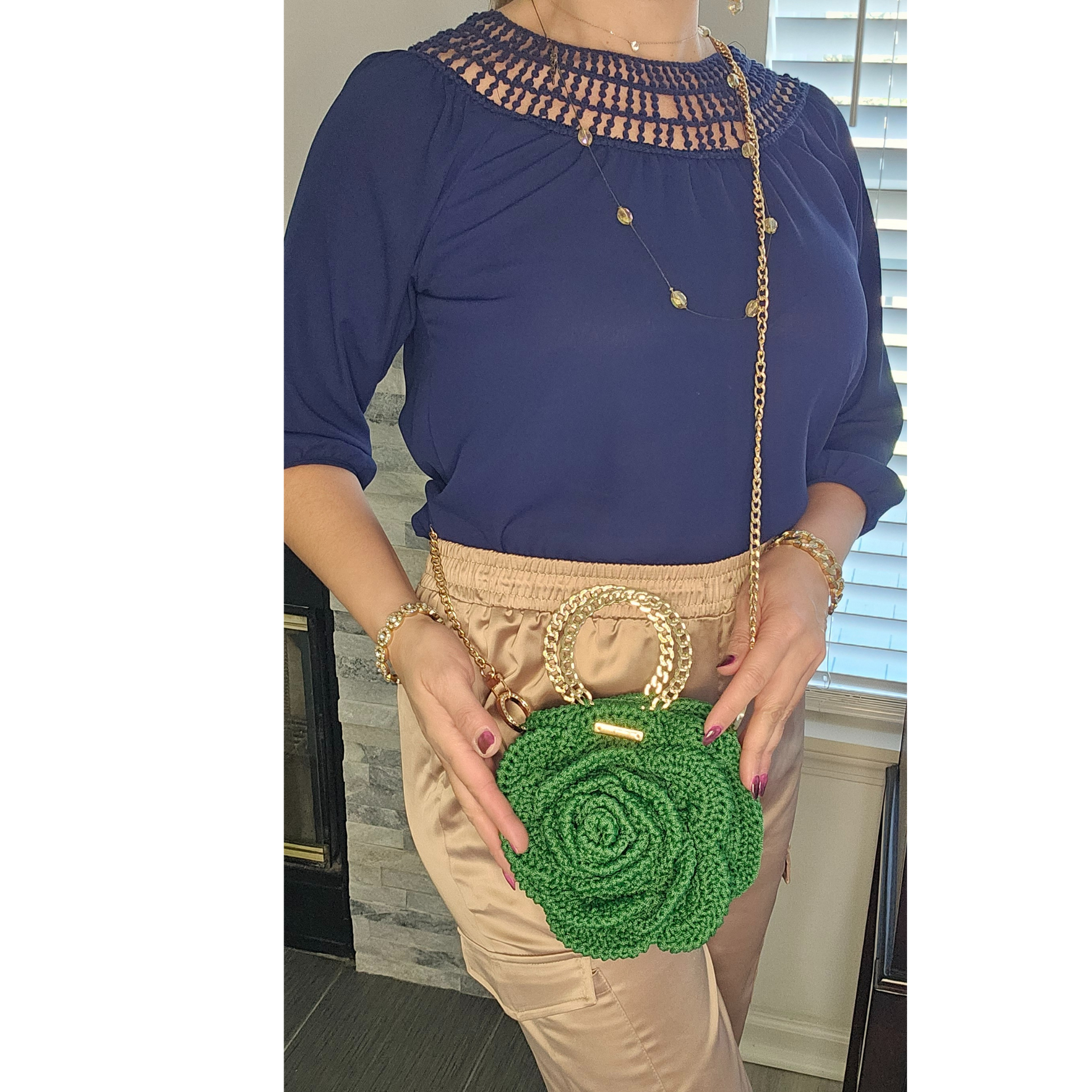 Model showcasing Green Rosa Bloom Macramé Crossbody – handmade 3D rose design bag, lightweight macramé craftsmanship with gold chain strap, perfect for Mother's Day, weddings, and summer outfits.