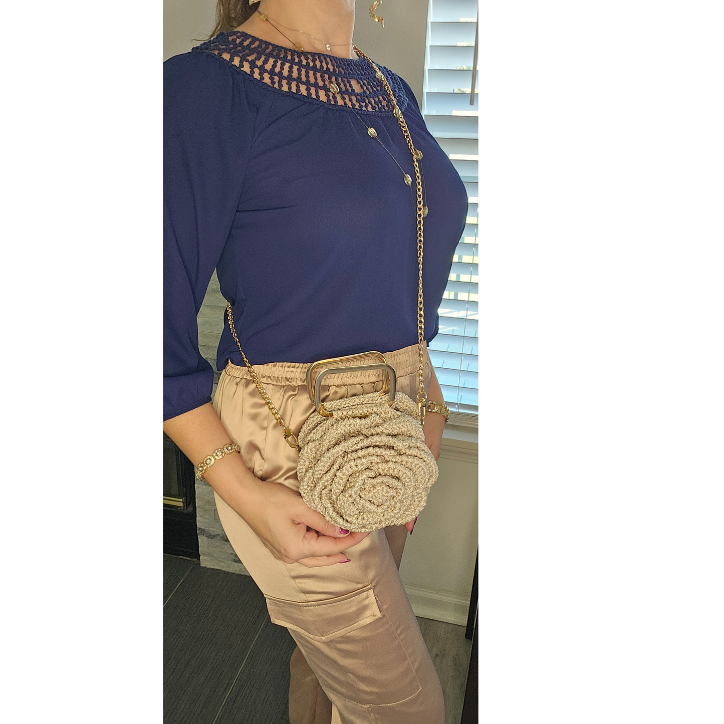 Fashion model showcasing Petite Bloom Macramé Tote – Handmade mini floral purse, perfect for elegant styling and gifting.
