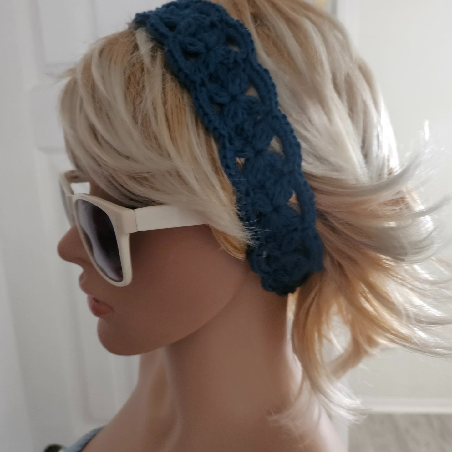 Navy flower headband model side pose