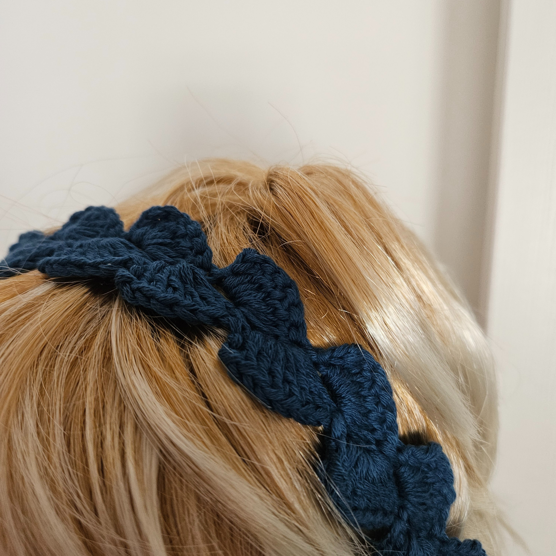 Navy petal headband model top head posing