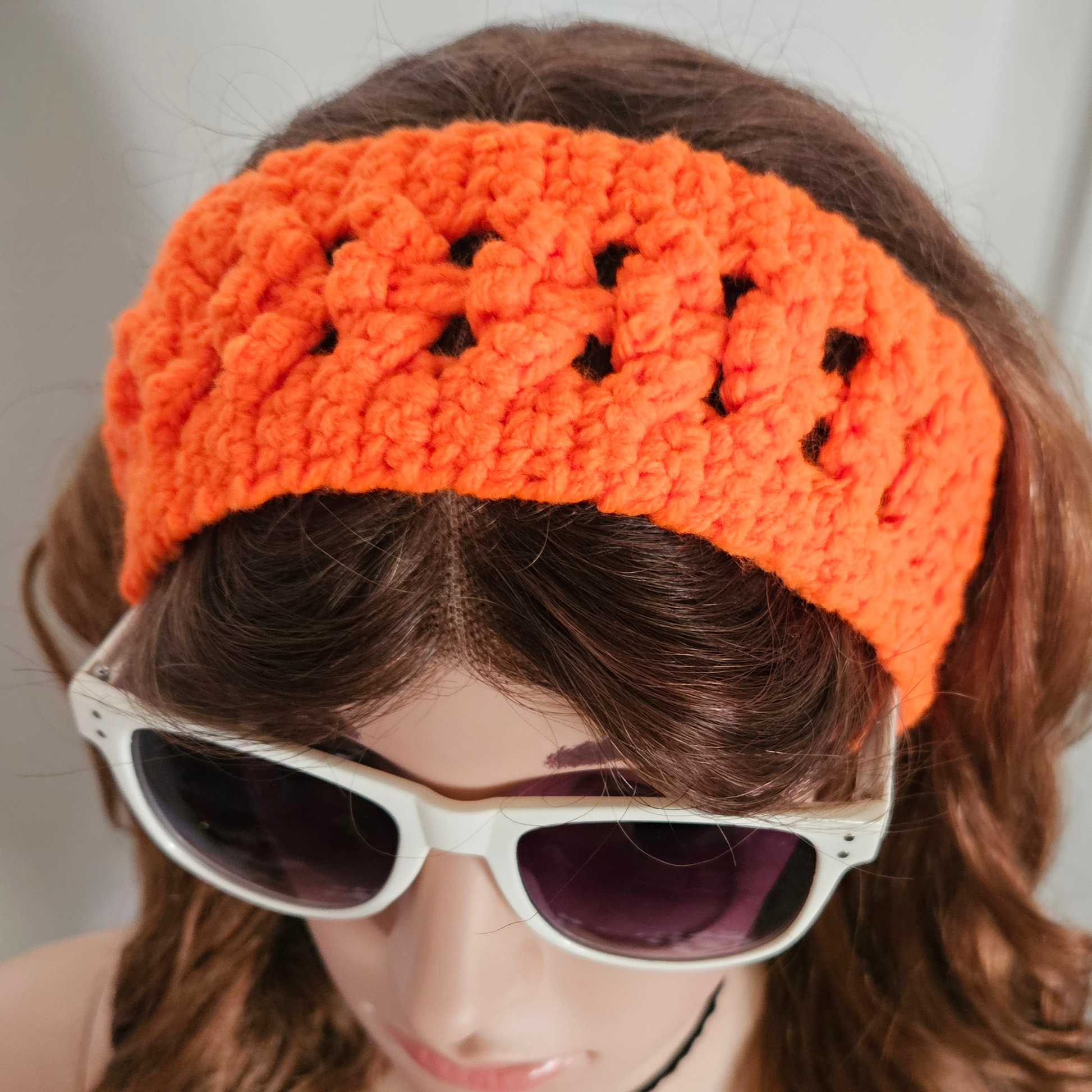 Orange wide headband photo model posing top head