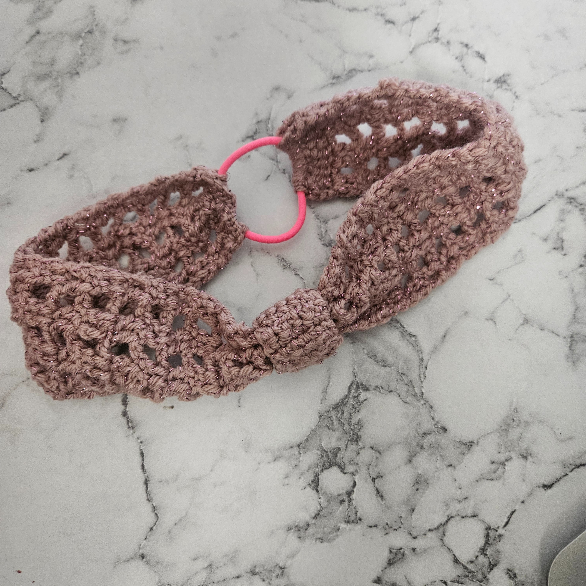 Pink knotted headband photo