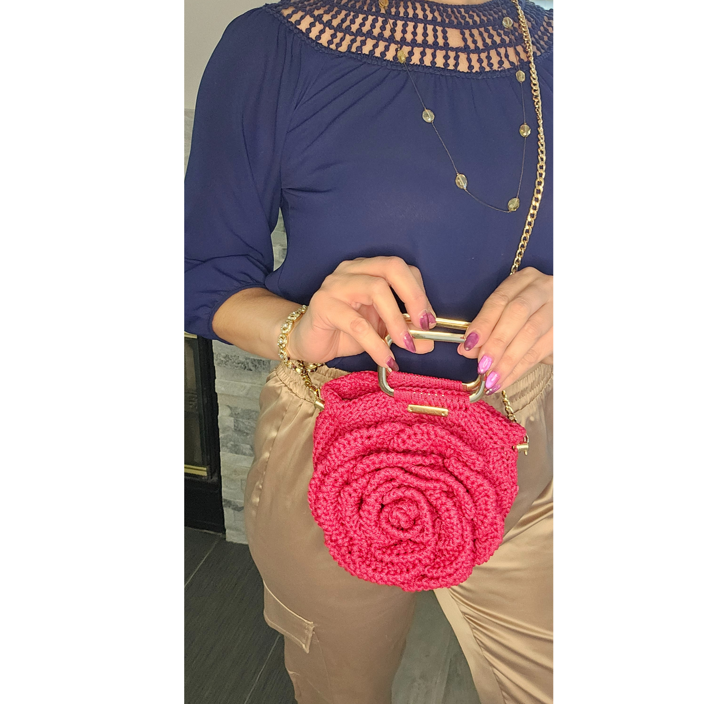 Model posing Close-up of Red Rosa Bloom Macramé Crossbody Gold handle detail on Rosa Bloom Macramé Crossbody – rectangular gold handle, versatile, chic carrying style.