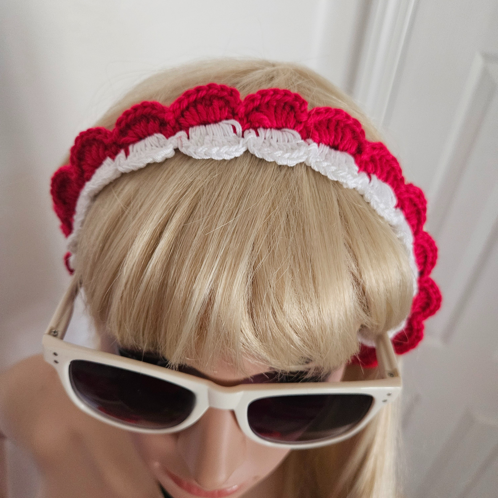 Red and white tie back crochet headband model face down photo