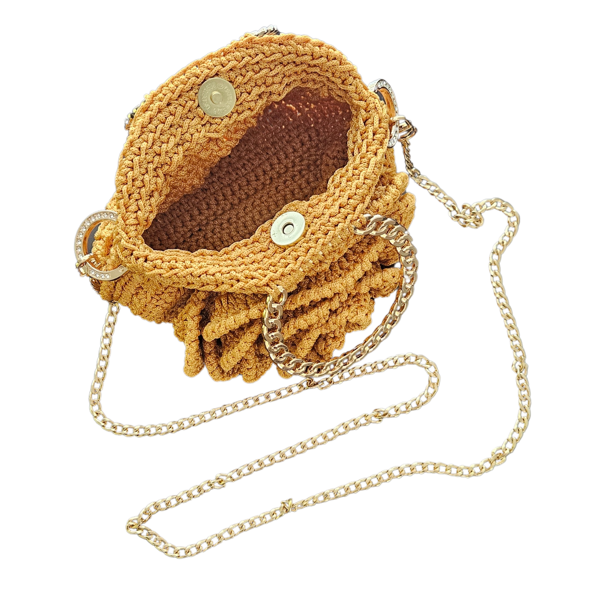 Interior view of Rosa Bloom Macramé Crossbody in gold –magnetic closer combining with gold crossbody chain,