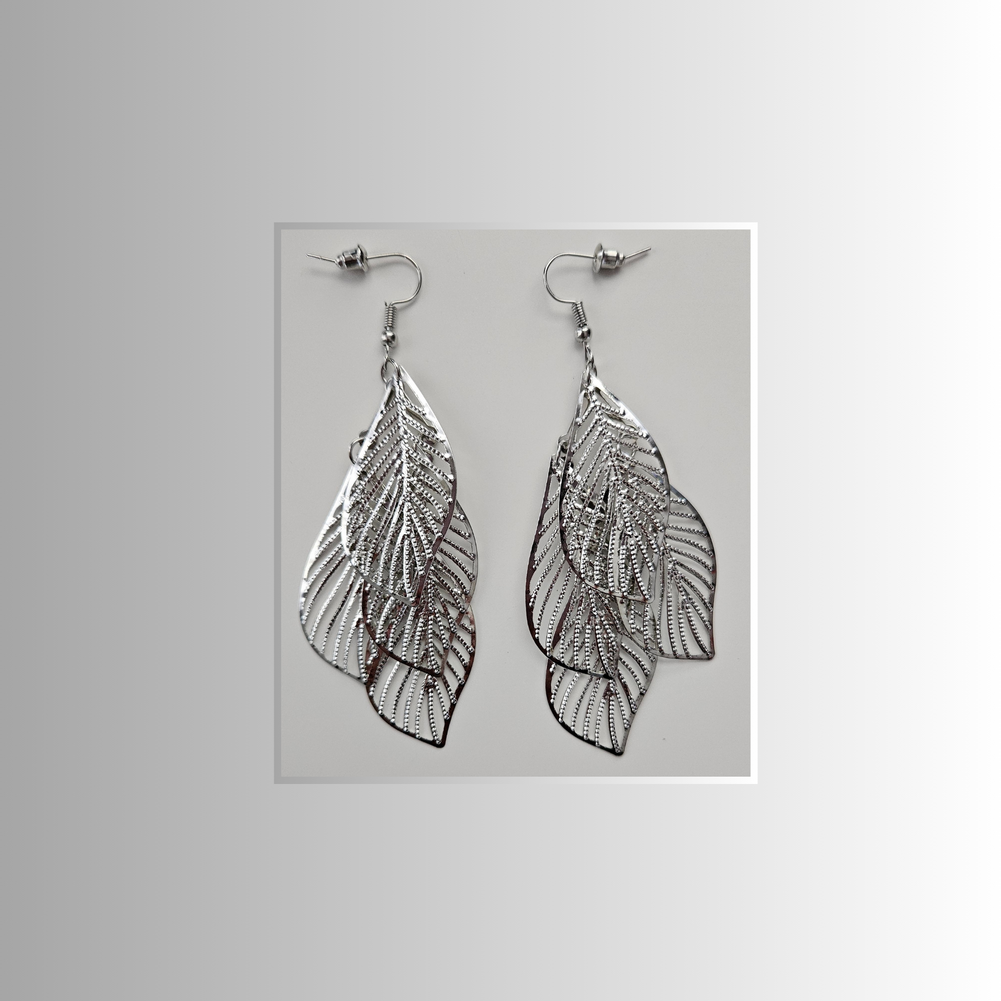 Four Leaf Silver Long Drop Earrings - Elegant and Timeless Accessories - Rita Rosa Brazilian Beachwear
