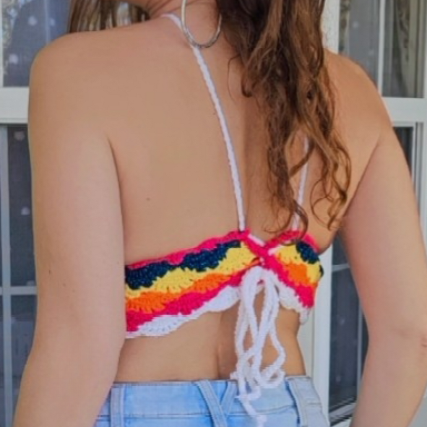 Rainbow Crisscross Crochet Cropped Top model back posing
