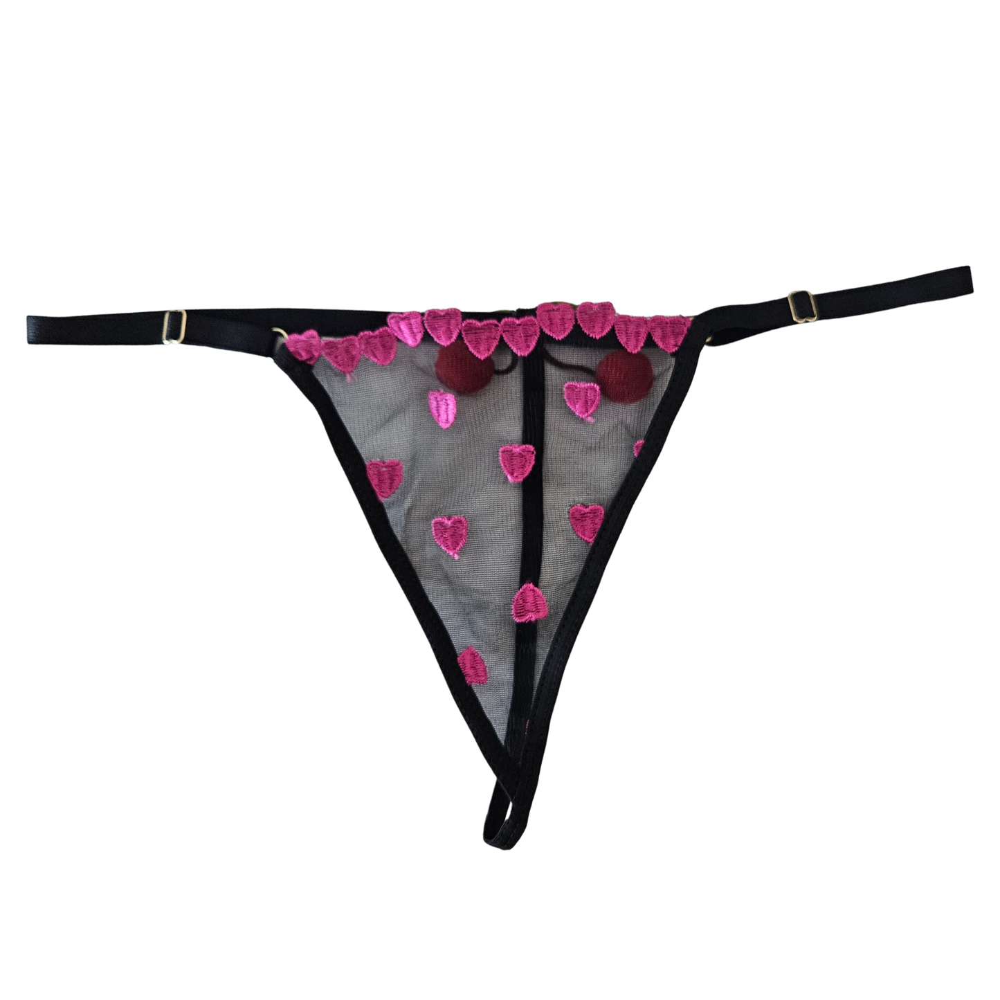 Black mesh thong with pink heart embroidery and black adjustable straps.