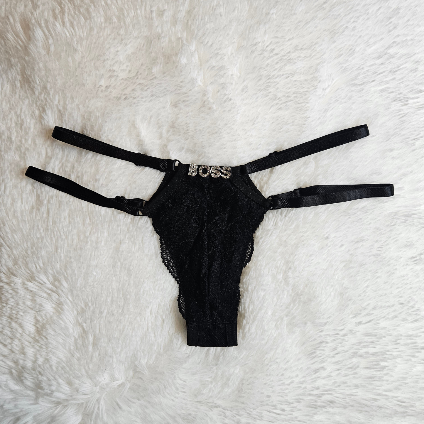 Back view of black Brilho Strappy Lace G-String with BOSS rhinestone hardware and adjustable four-strap system