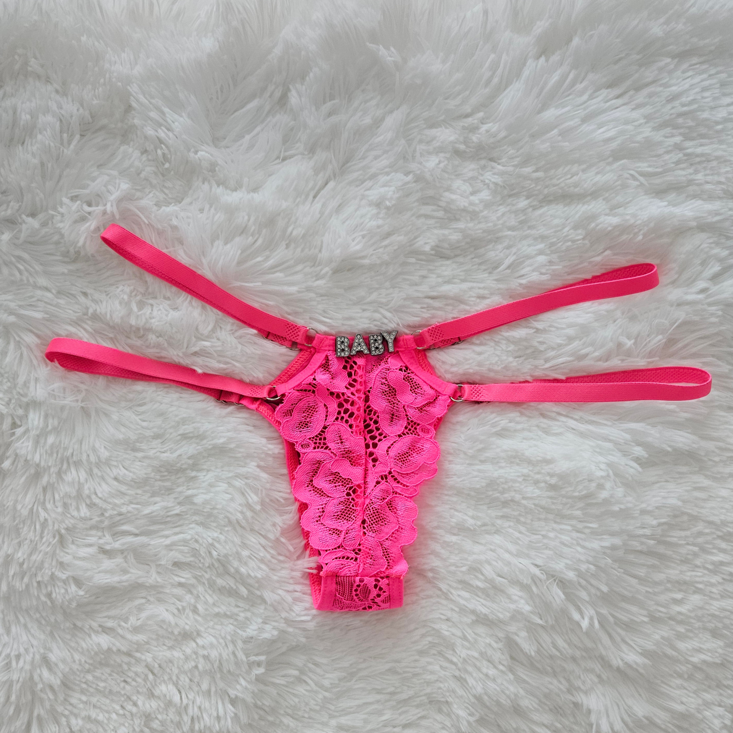 Rita Rosa pink floral lace statement G-string featuring a BABY rhinestone word and premium adjustable four-strap system.