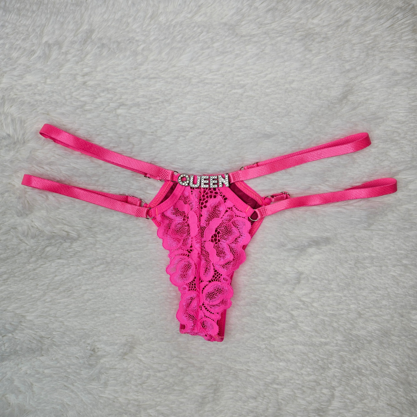 Rita Rosa pink floral lace statement G-string featuring a QUEEN rhinestone word and premium adjustable four-strap system
