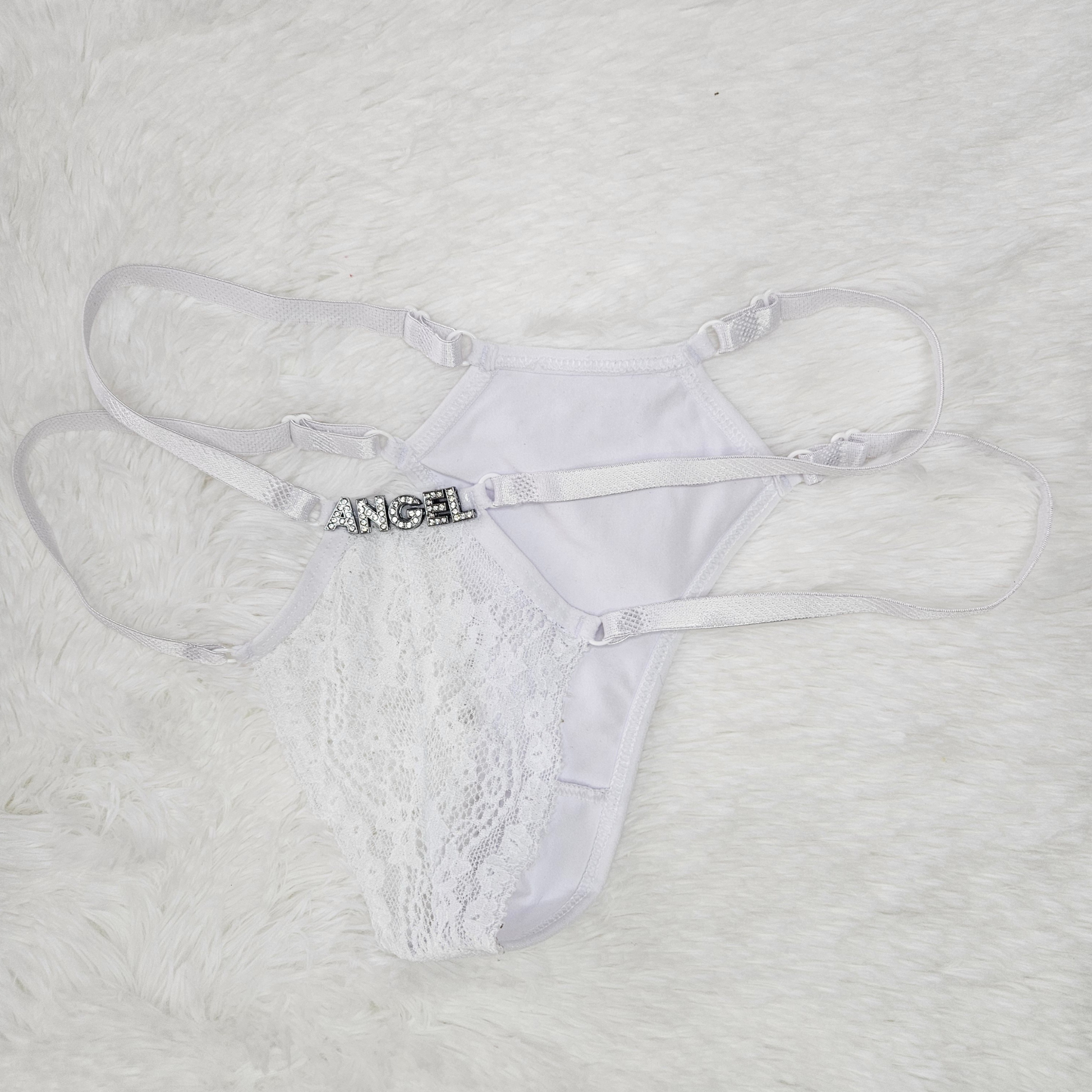 Back view of white Brilho Strappy Lace G-String with ANGEL rhinestone hardware and adjustable four-strap system