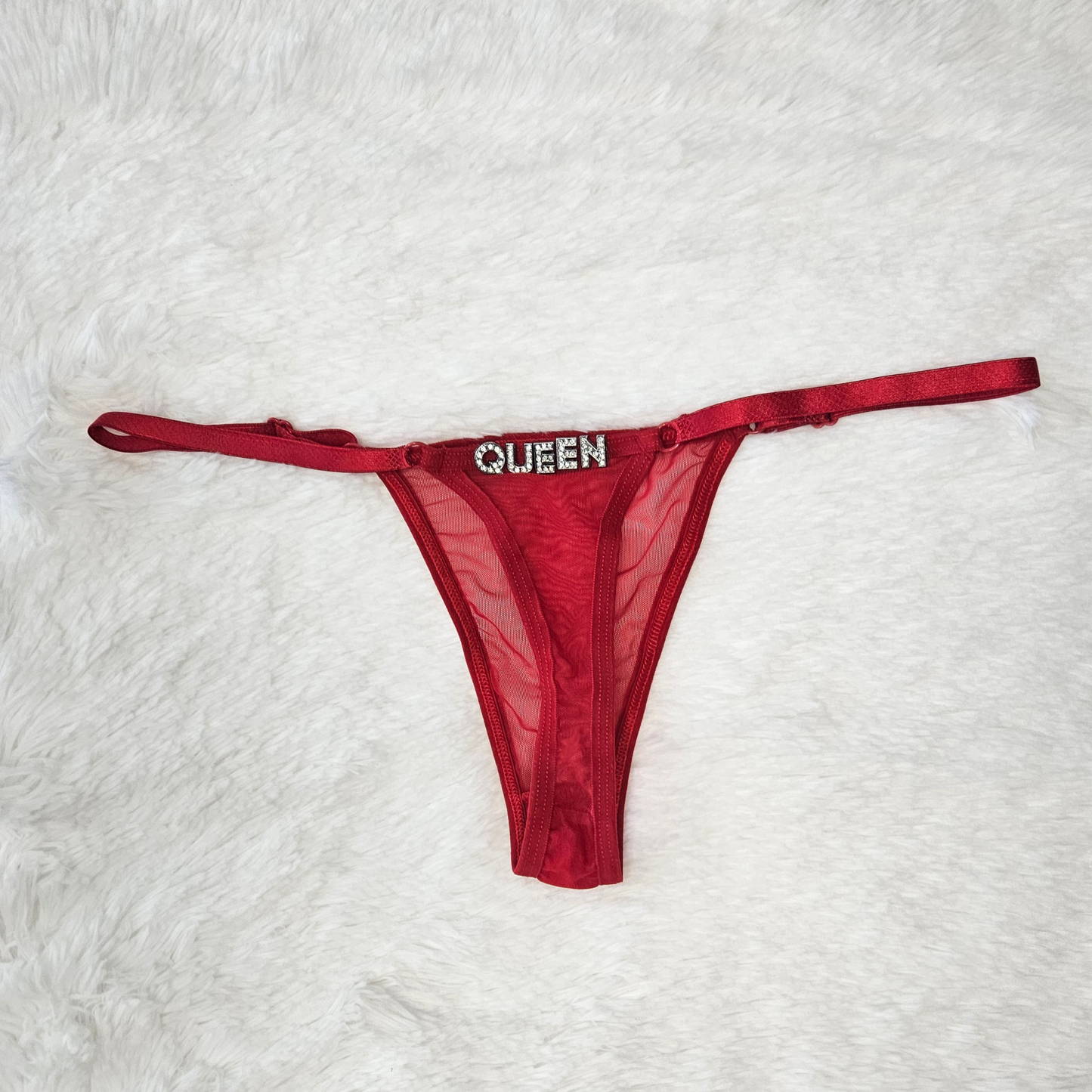 Red sheer Brazilian mesh G-string with hand-applied QUEEN rhinestone statement.
