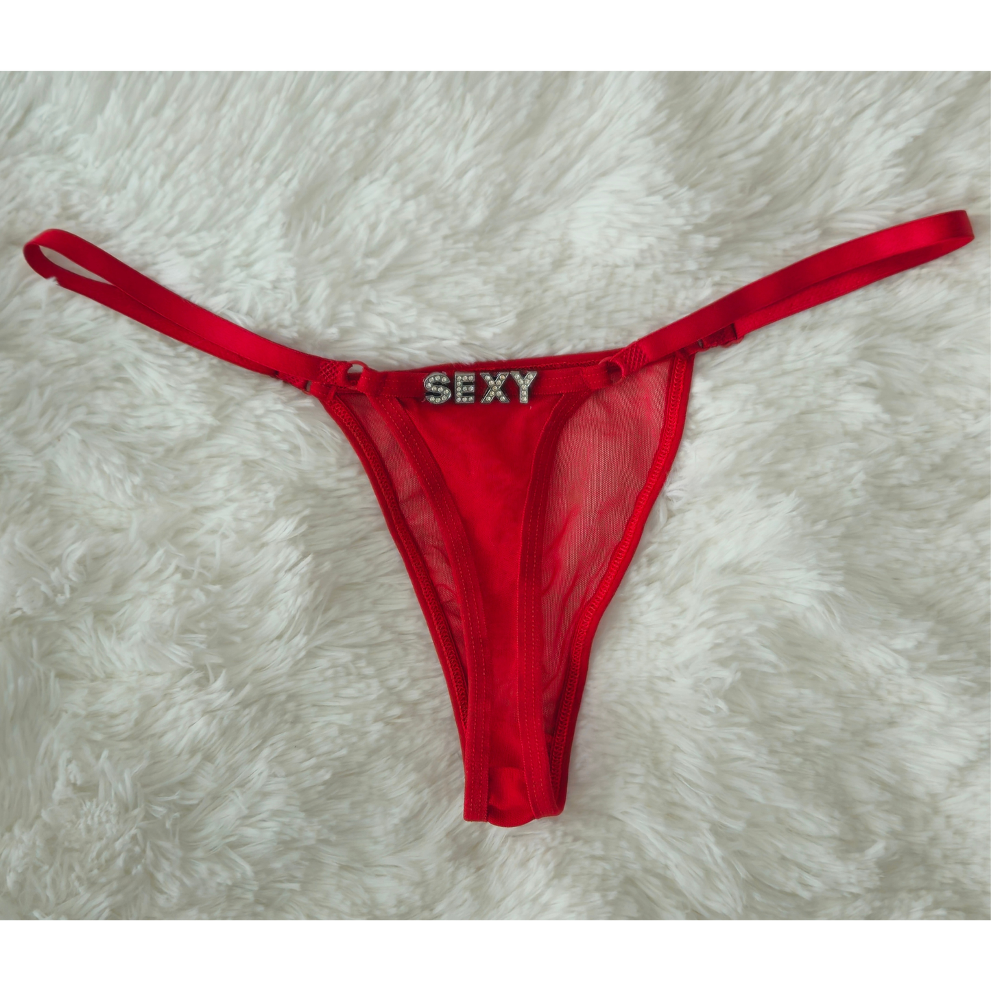 Hand-finished red Brazilian lace G-string with SEXY rhinestone statement charm
