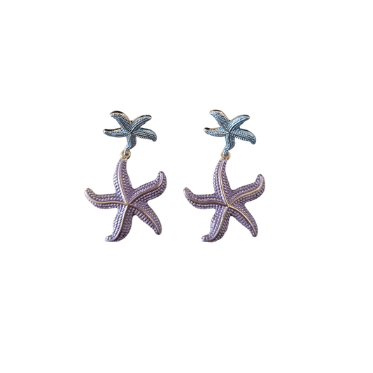 Starfish-shaped earrings on a white background