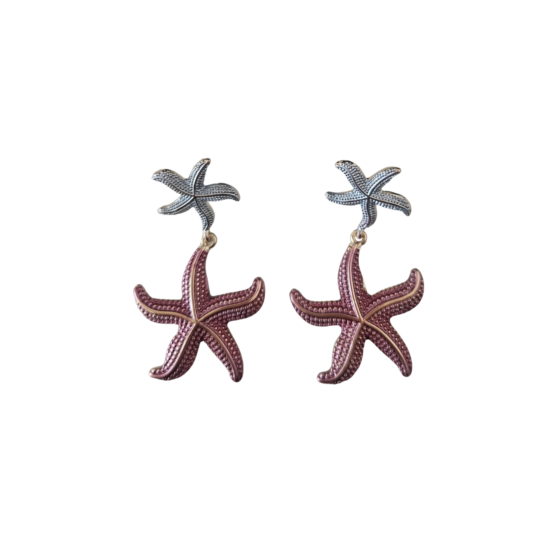 Starfish-shaped earrings on a white background