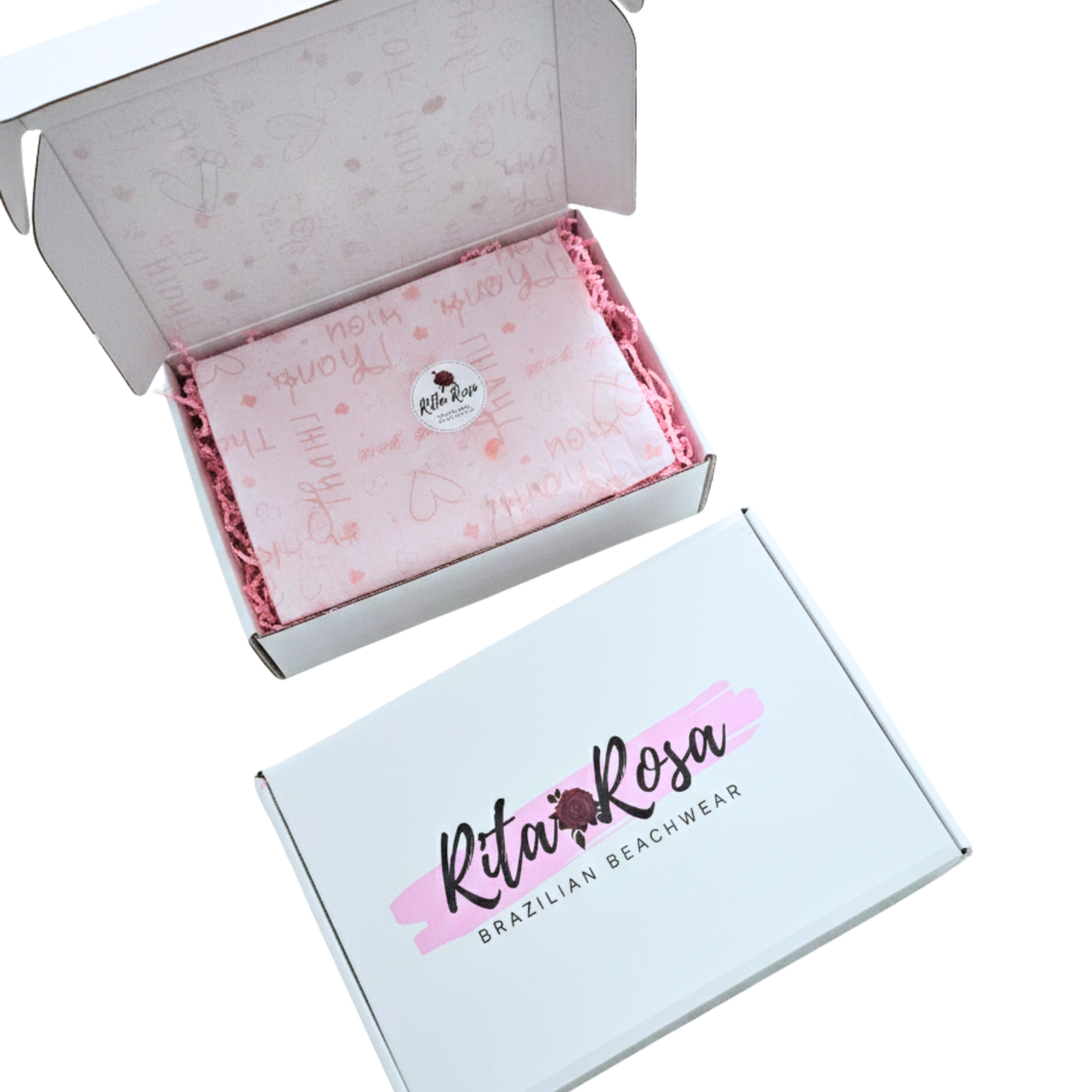 Interior view of Rita Rosa 8x10x3 gift box featuring pink tissue paper and shredded paper for a luxury unboxing experience.