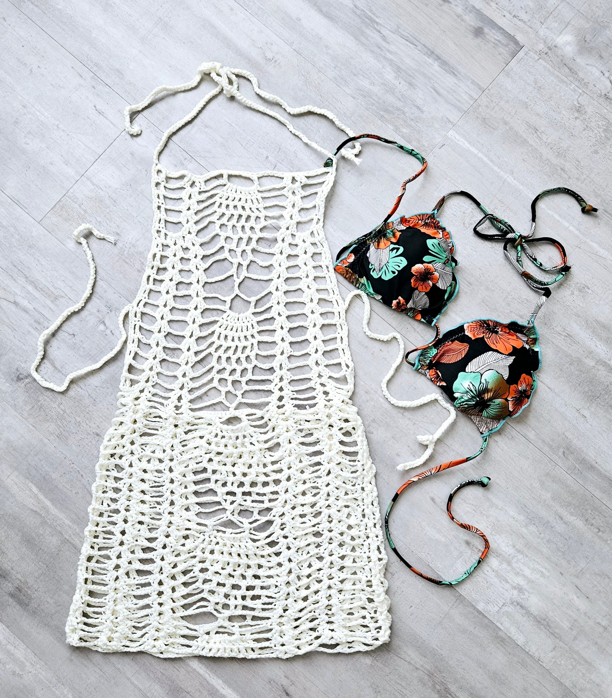 Image of an Off-White Knitted Crochet Dress Cover-Up by Rita Rosa Brazilian Beachwear, featuring a solid print and elegant design. 