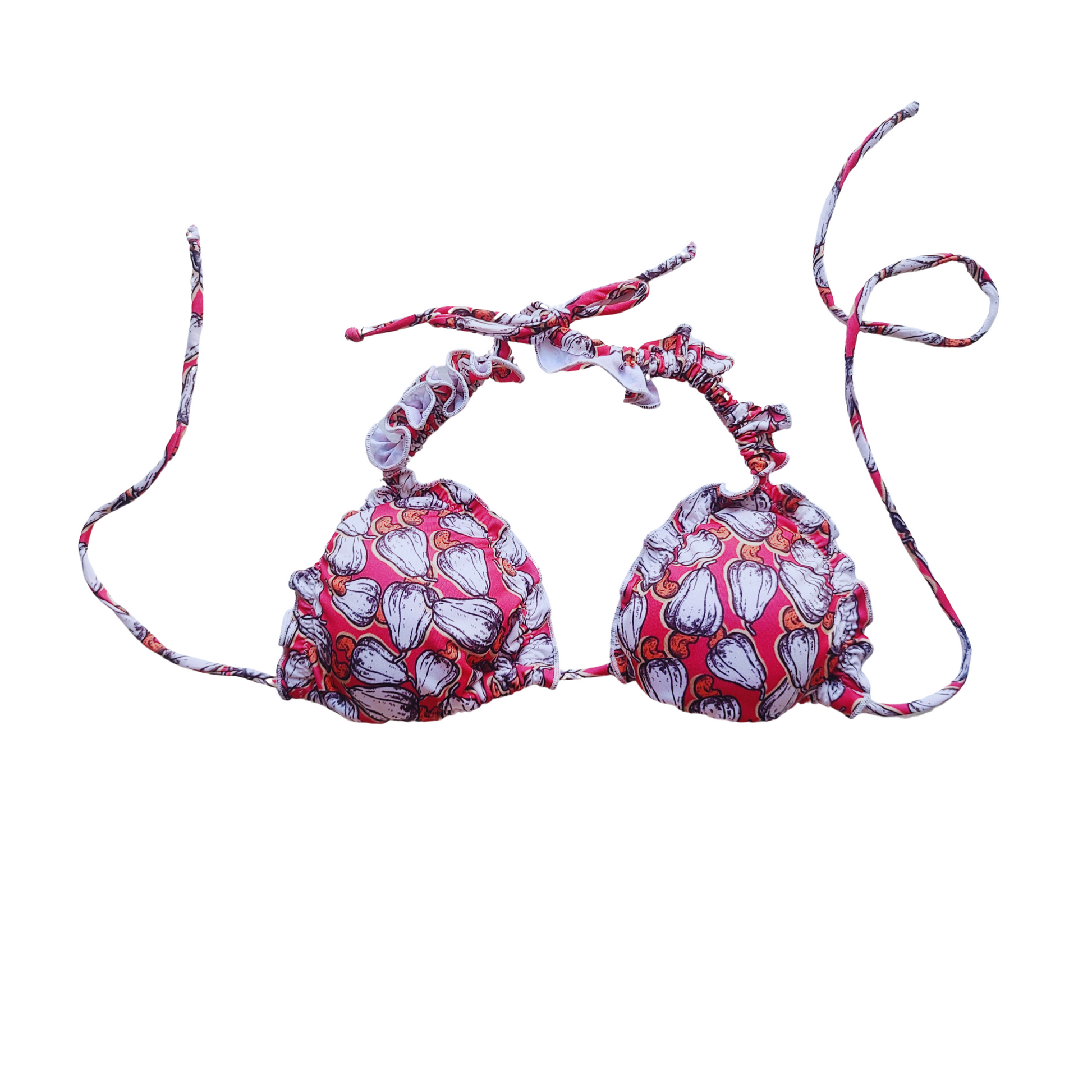 Woman wearing a cajun print bikini set with tie straps, ruffled details, and neck ties, perfect for a stylish and comfortable day at the beach or pool.