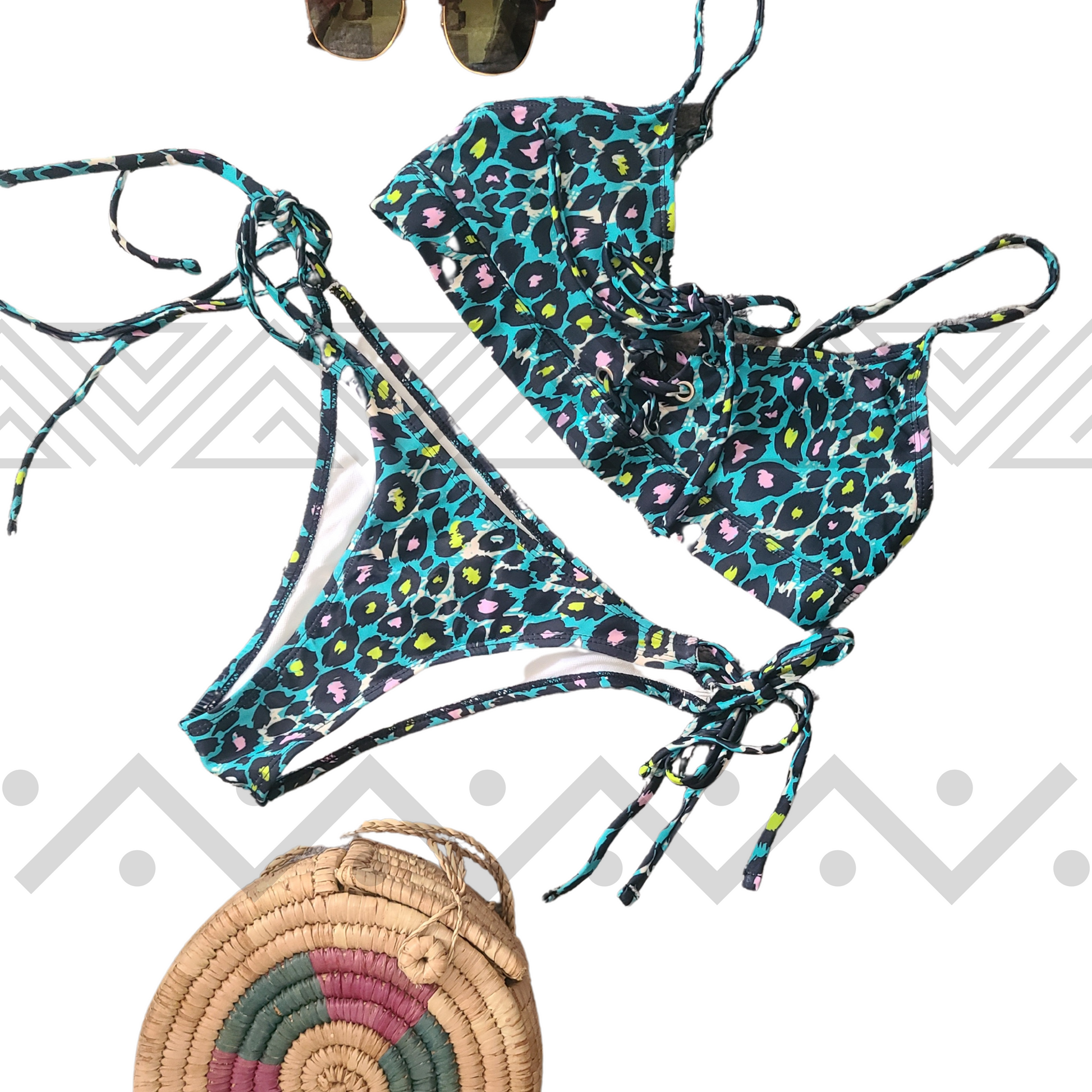 A spaghetti strap bikini set in a bold cheetah pattern with a double-strap bottom.
